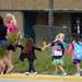 Young girls walk hand-and-hand as they make their way to  Logan Elementary School on the first day of school on Tuesday, September 3, 2013. Melanie Maxwell | AnnArbor.com